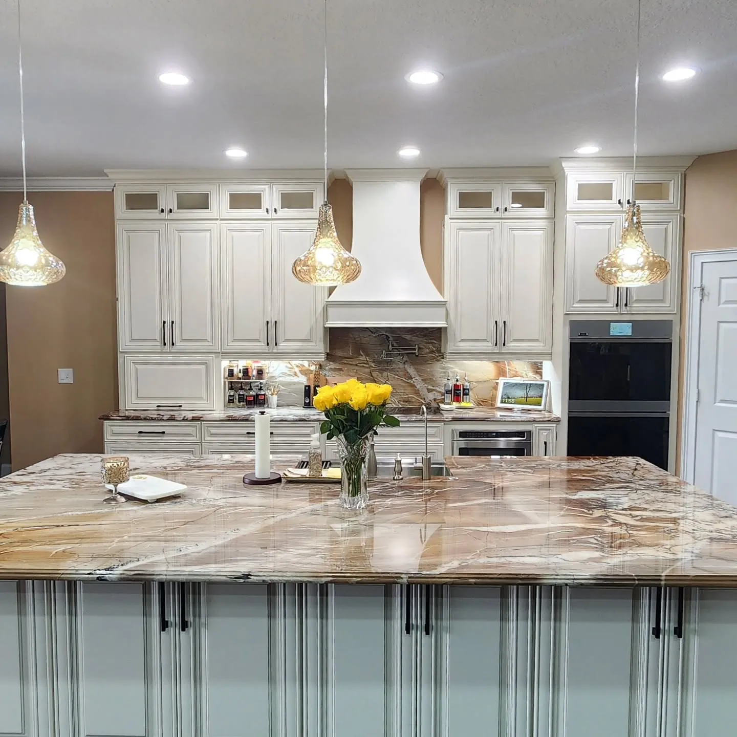 Remodeled Orlando kitchen with granite island and pendant lighting